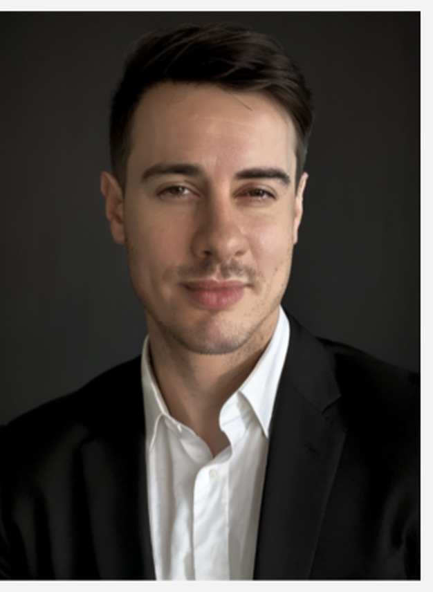 Daniel Armand Salinas, board member of Ryan Trading Co., in a dark suit